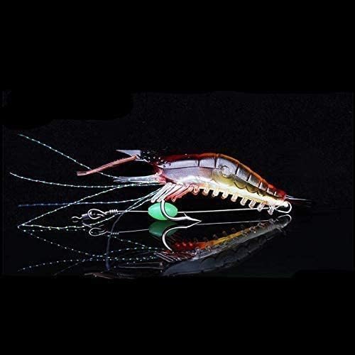 Close-up of luminous shrimp lure glowing under dark background