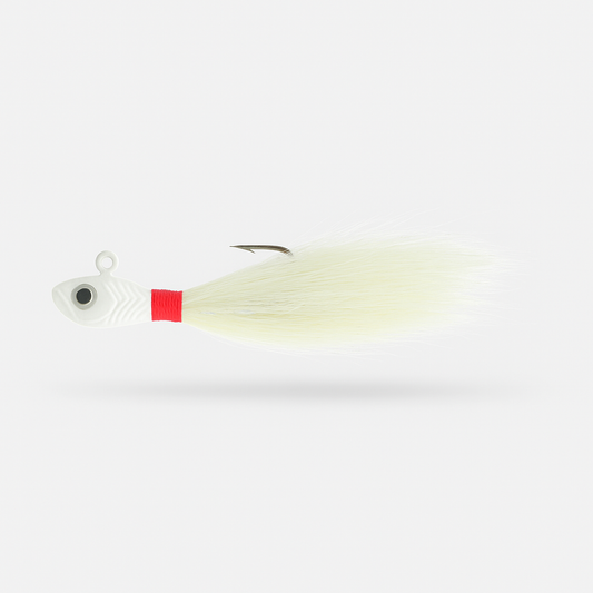 Backwater Bucktail Jig Snowflash 1/2 oz 4.5 in saltwater lure facing left, natural bucktail hair with powder-coated glow head.

