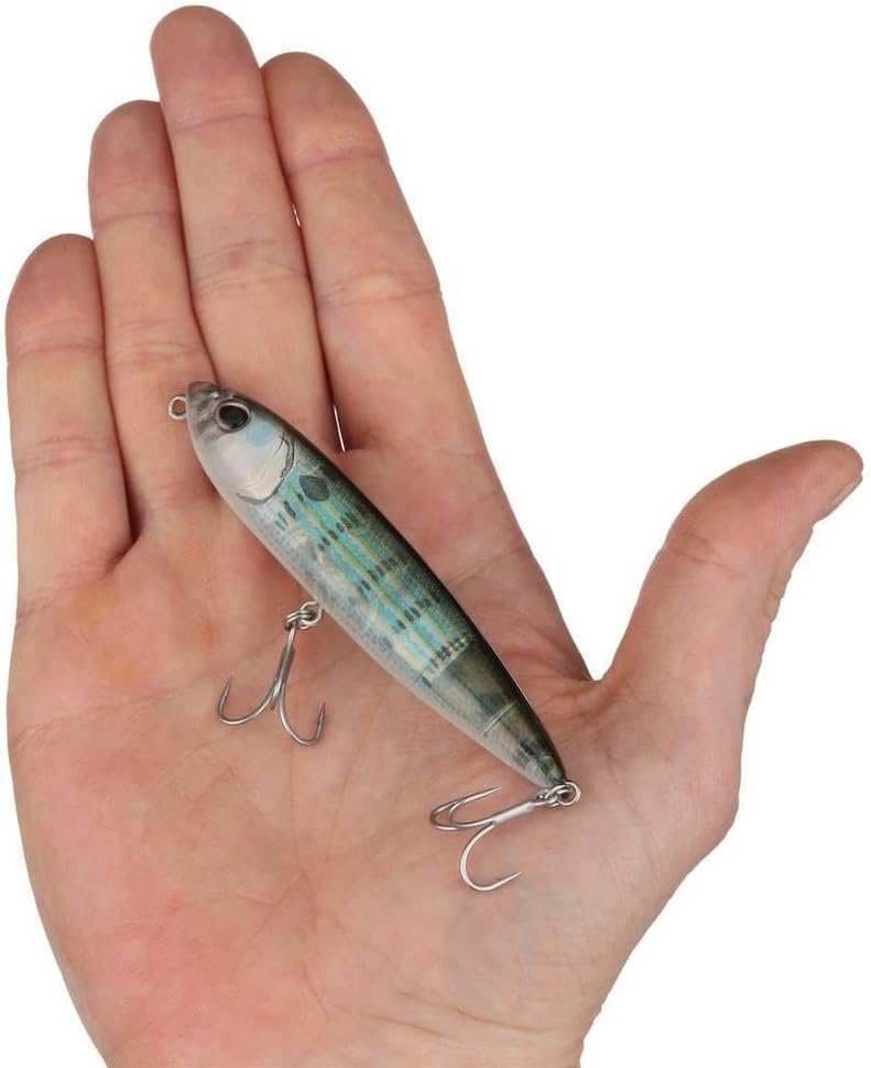 Hand holding 3.5 inch topwater J-Walker 90 lure to show scale